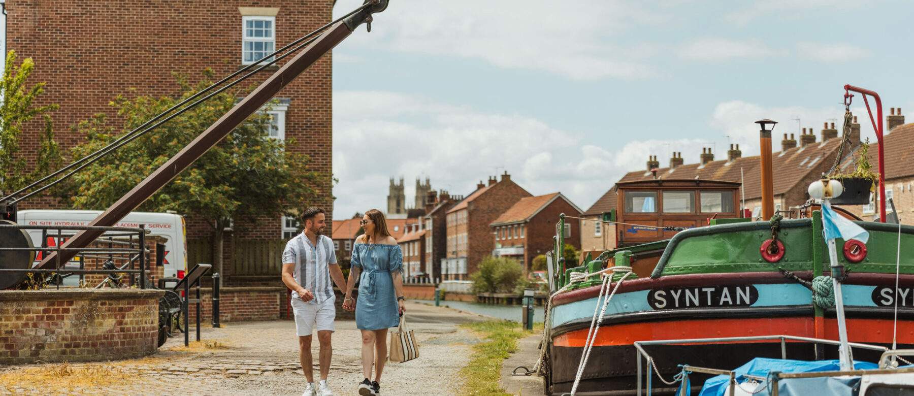 couple walking by beverley beck