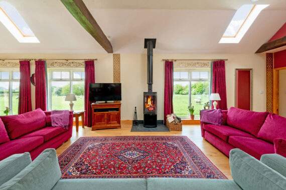 sitting area with 3 sofas 