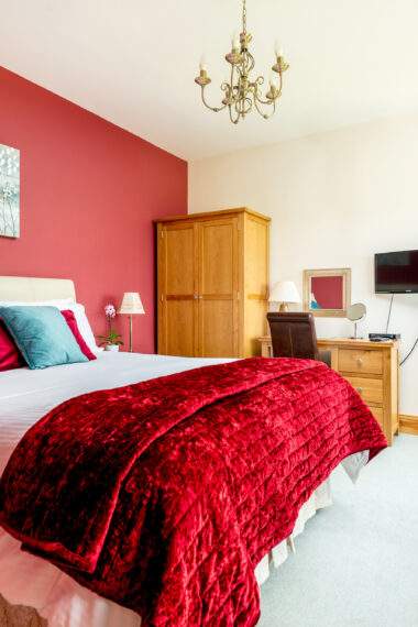 large superking bed with oak bedroom furnitire