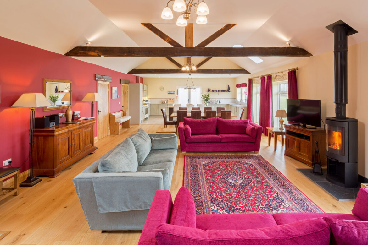 large living room with kitchen at the far end