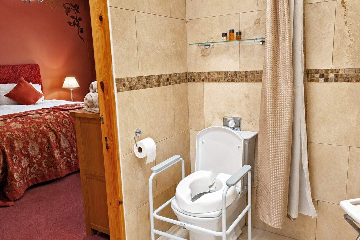 wet room ensuite to the family room with the portable mobility equipment