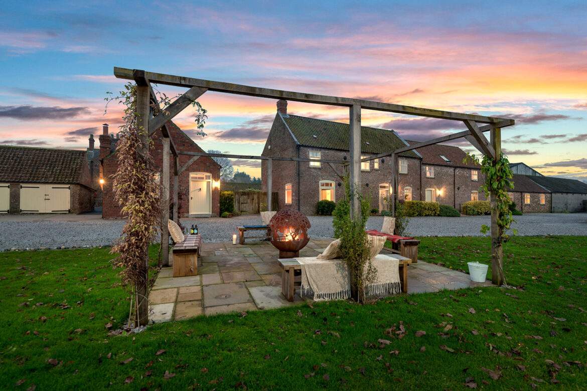 Granary cottage at dusk behind the fireball area
