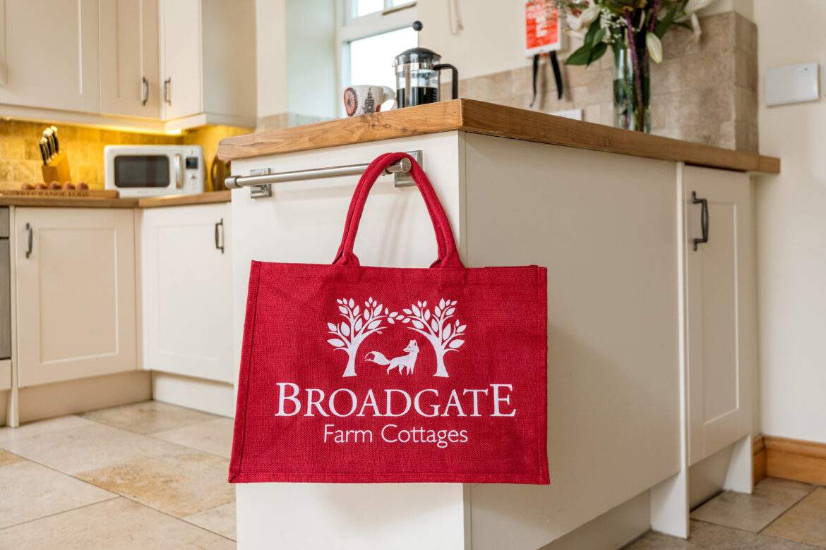 red branded jute shopping bag in the kitchen