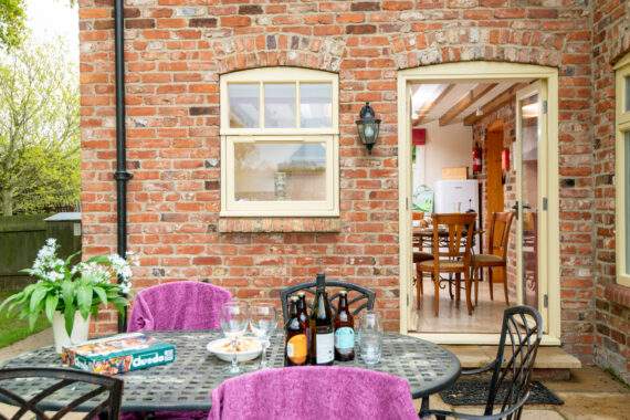 Forge at Broadgate Farm cottages has an outside dining area on the patio 