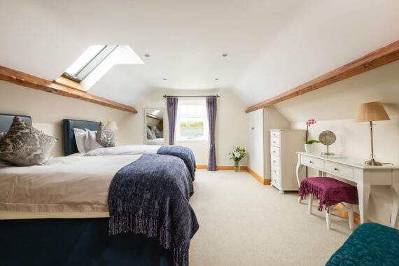 Spacious second bedroom in the Forge, can be set up as two single beds as shown or as a superking 