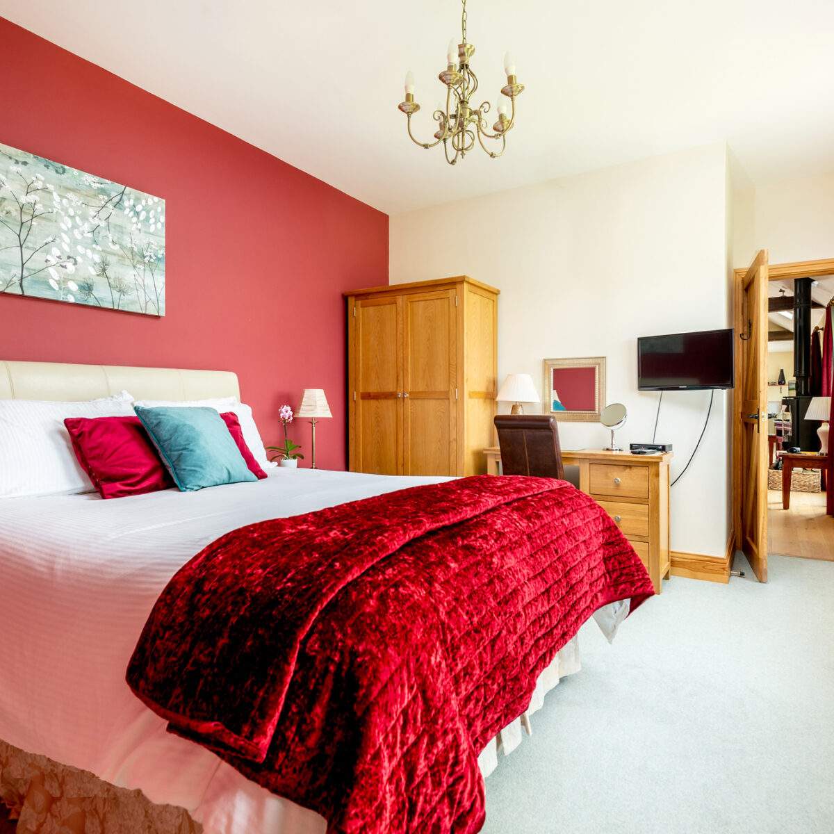 Master bedroom in Cart House with views across the fields - superking bed 