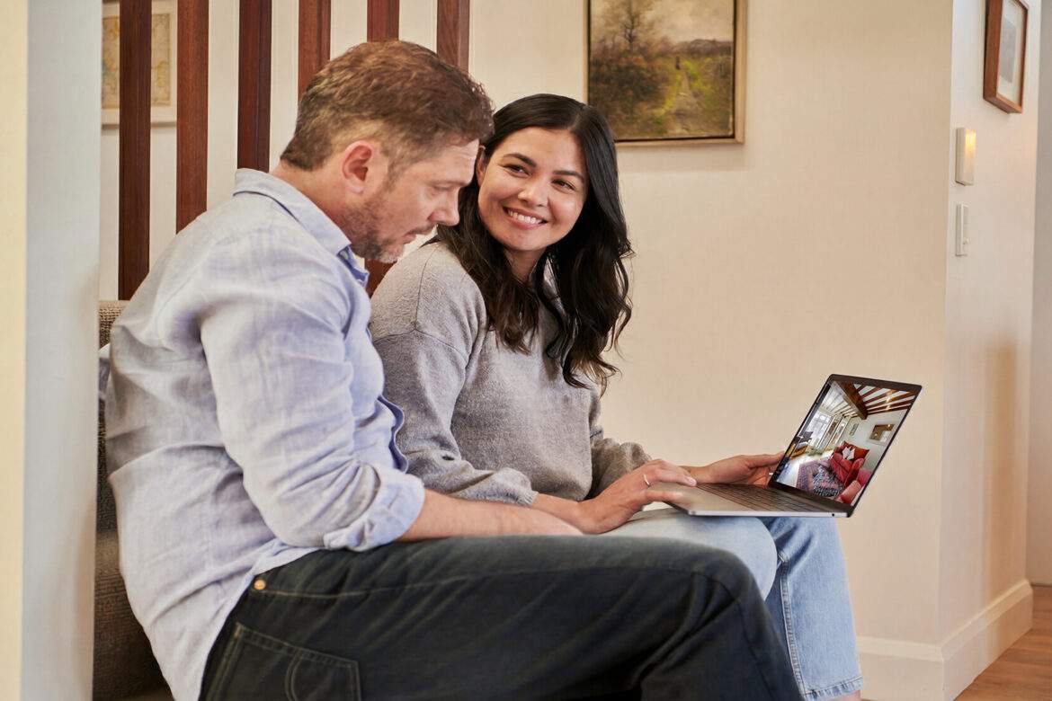 Young couple looking at virtual tours on a laptop - Docusign on Unsplash
