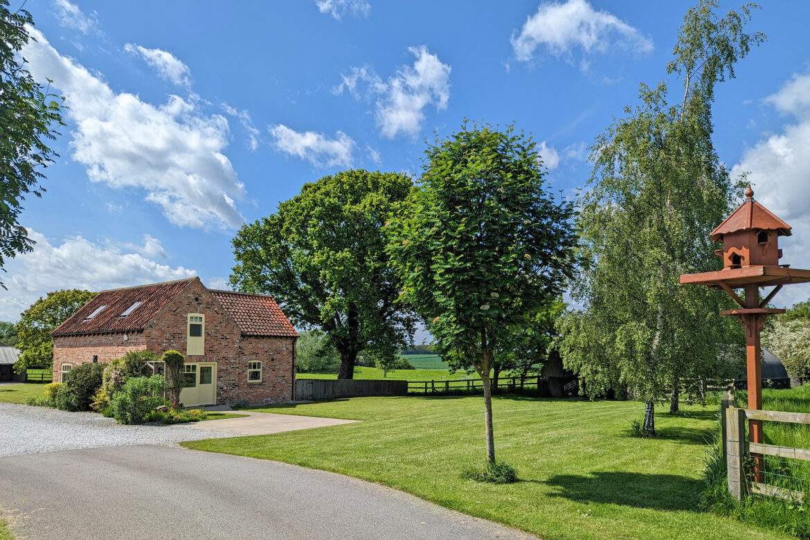 A detached cottage at the end of the drive