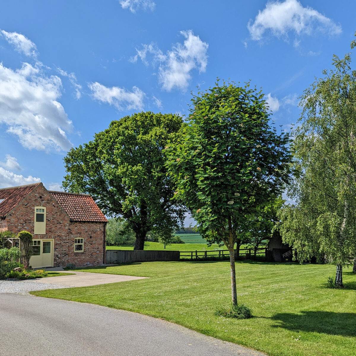forge-from-entrance The approach to Forge cottage showing the surrounding green countryside
