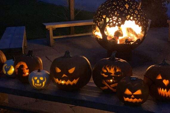 nightime with lit pumpkins