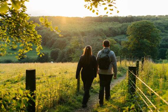 couple walking down a footpath yorkshire